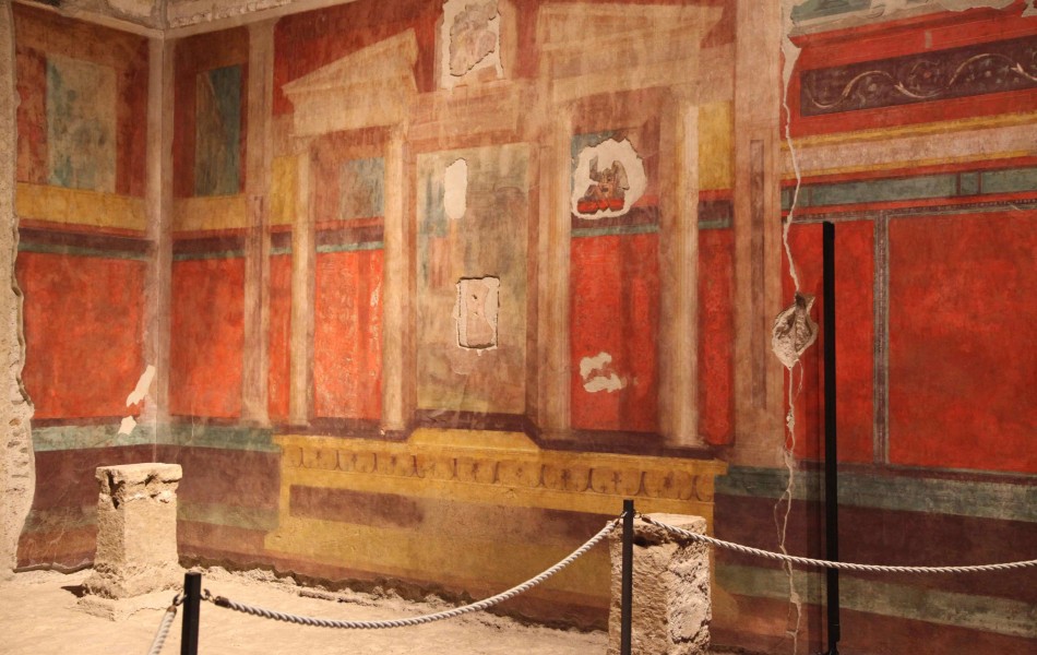 Affreschi Romani nella Stanza delle Maschere dentro la Casa di Augusto sul Palatino in un Tour dei Super Siti di Roma